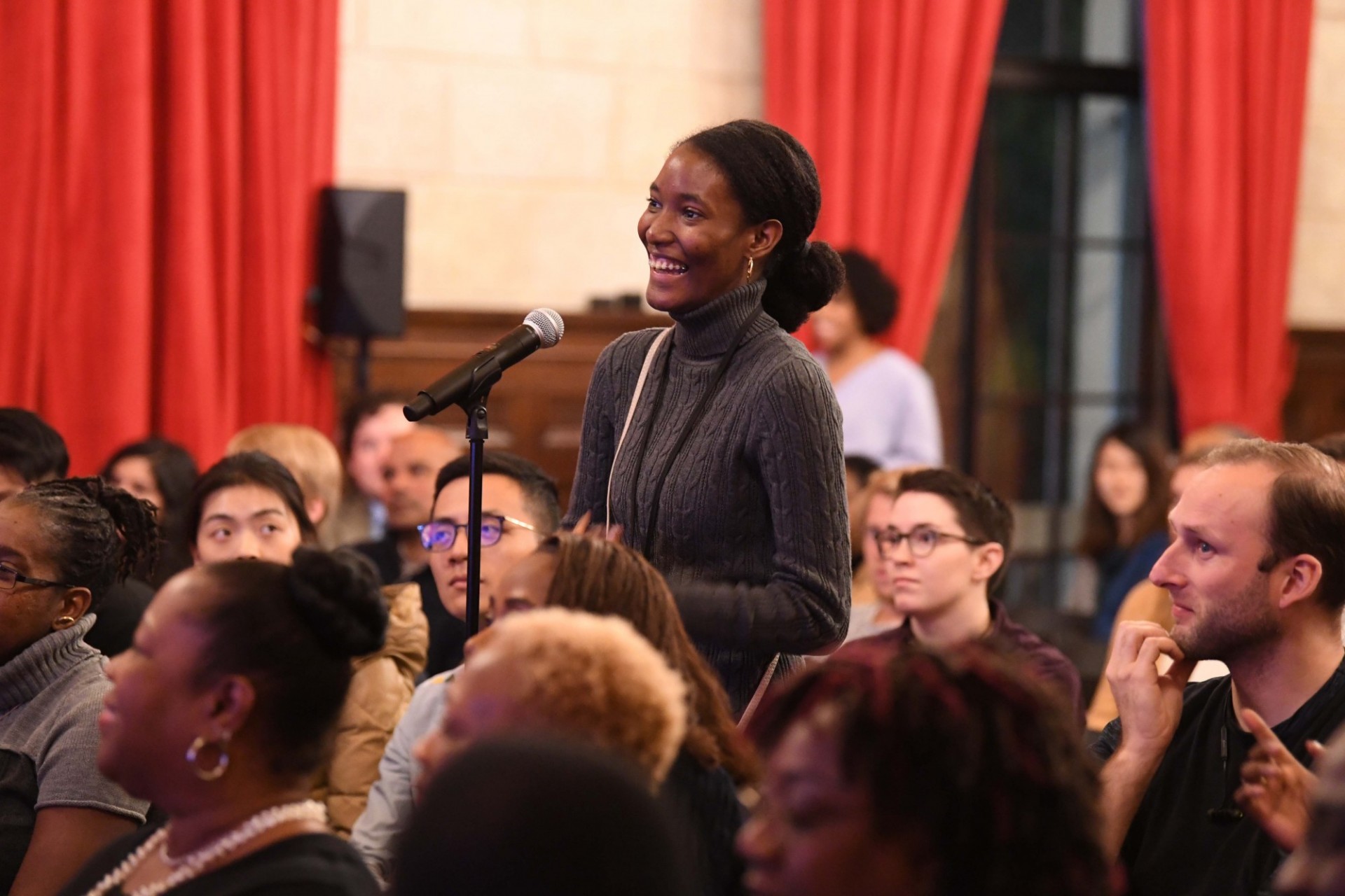 Columbia University students line up to ask President Paula-Mae Weekes of the Republic of Trinidad and Tobago questions during the question and answer session.