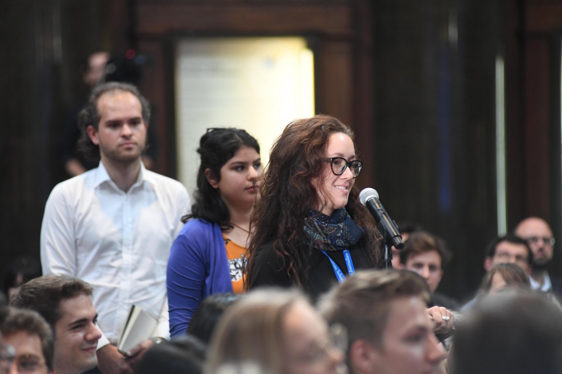 Columbia University students line up to ask Federal Chancellor Brigitte Bierlein of the Republic of Austria questions during the question and answer session.