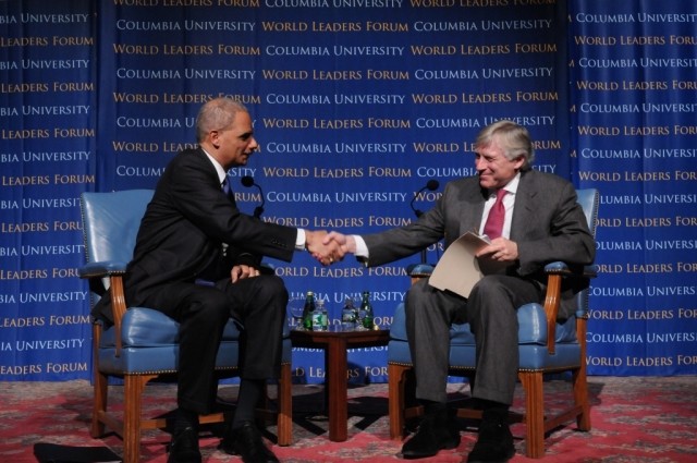 Eric H. Holder Jr. and President Lee C. Bollinger at the conclusion of the World Leaders Forum program on February 23, 2012.