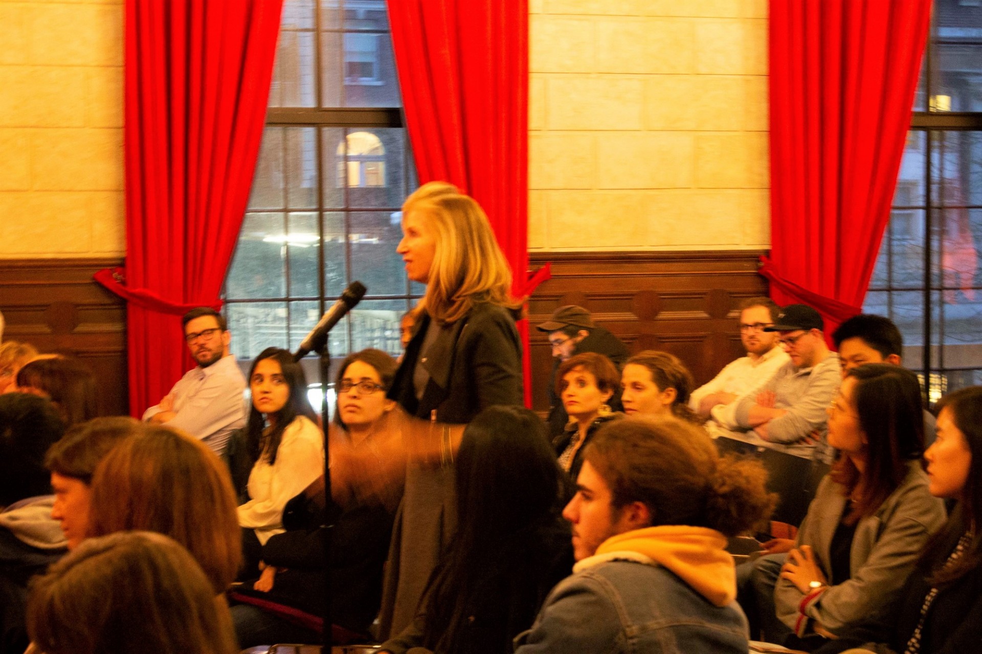 Columbia University students line up to ask the panelists questions during the question and answer session.