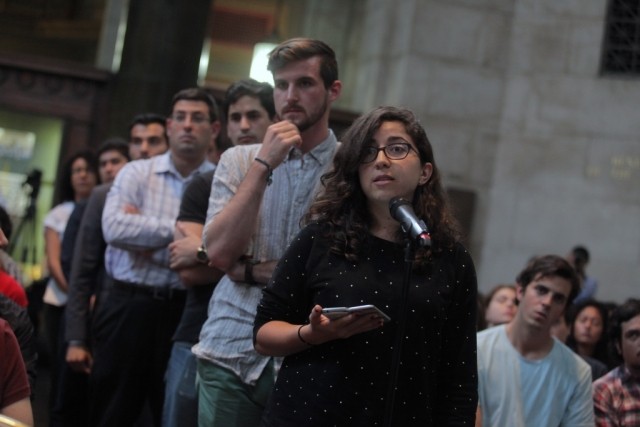 Columbia University students line up to ask President Santos a question during the question and answer session. 
