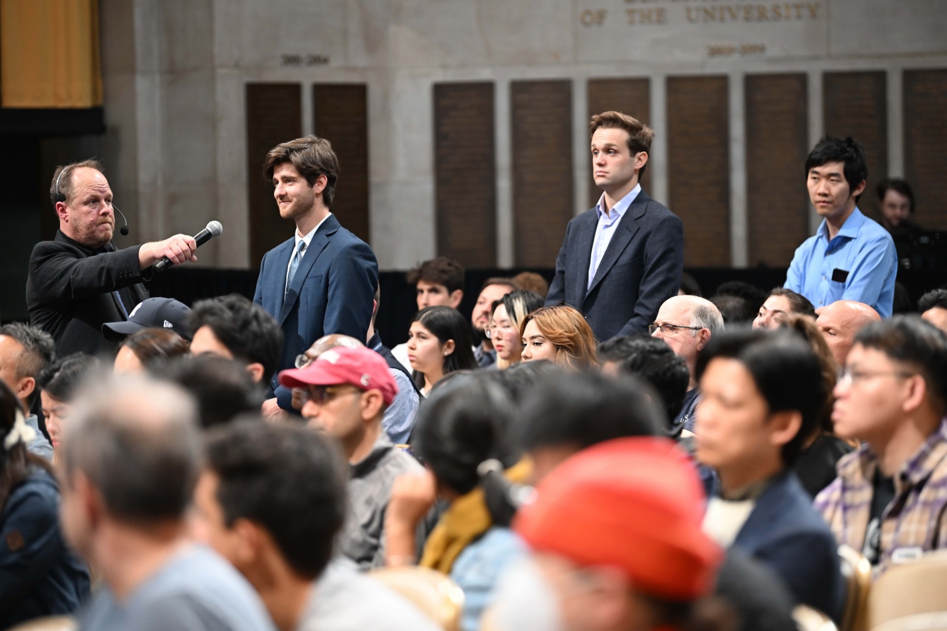 Columbia University students line up and ask questions during the World Leaders Forum event Q&A