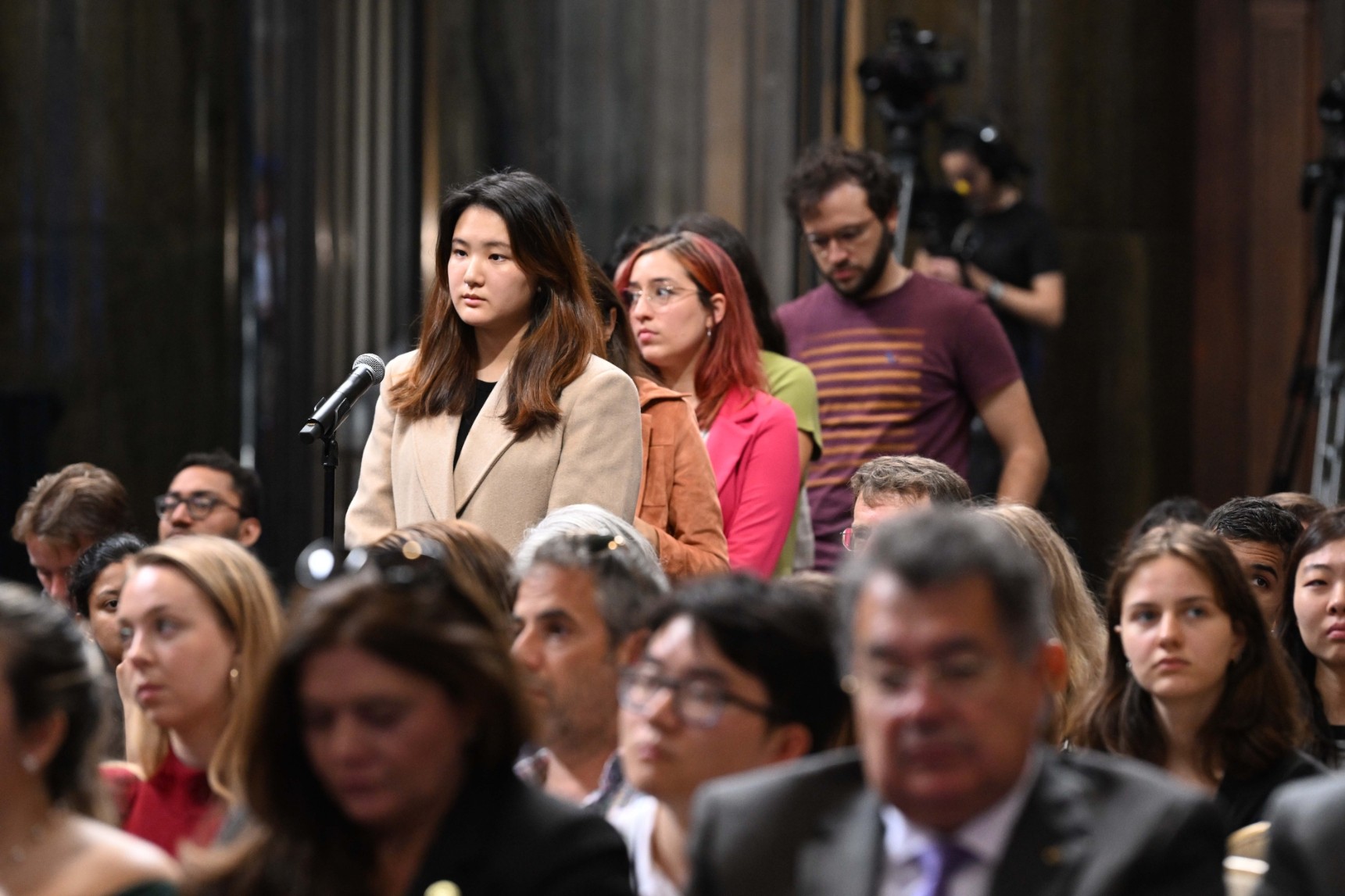 Columbia University students line up and ask questions during the World Leaders Forum event Q&A