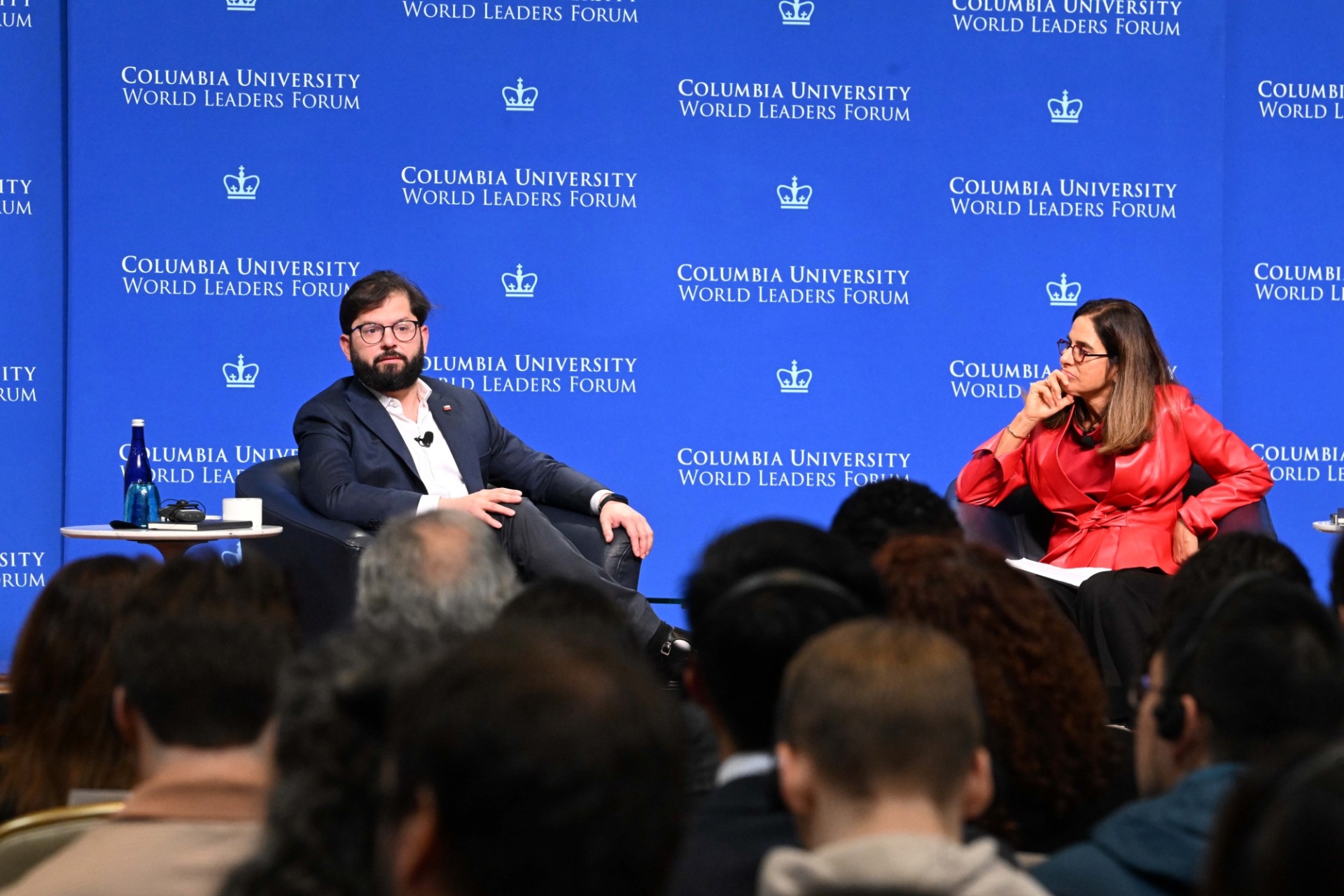 President of Chile and Moderator Maria Victoria Murillo engaging in discussion.