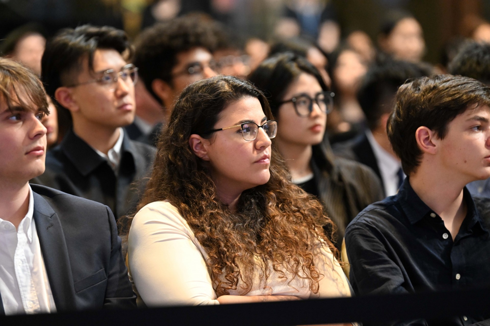 An audience of Columbia University students, scholars, and faculty listening to the discussion.