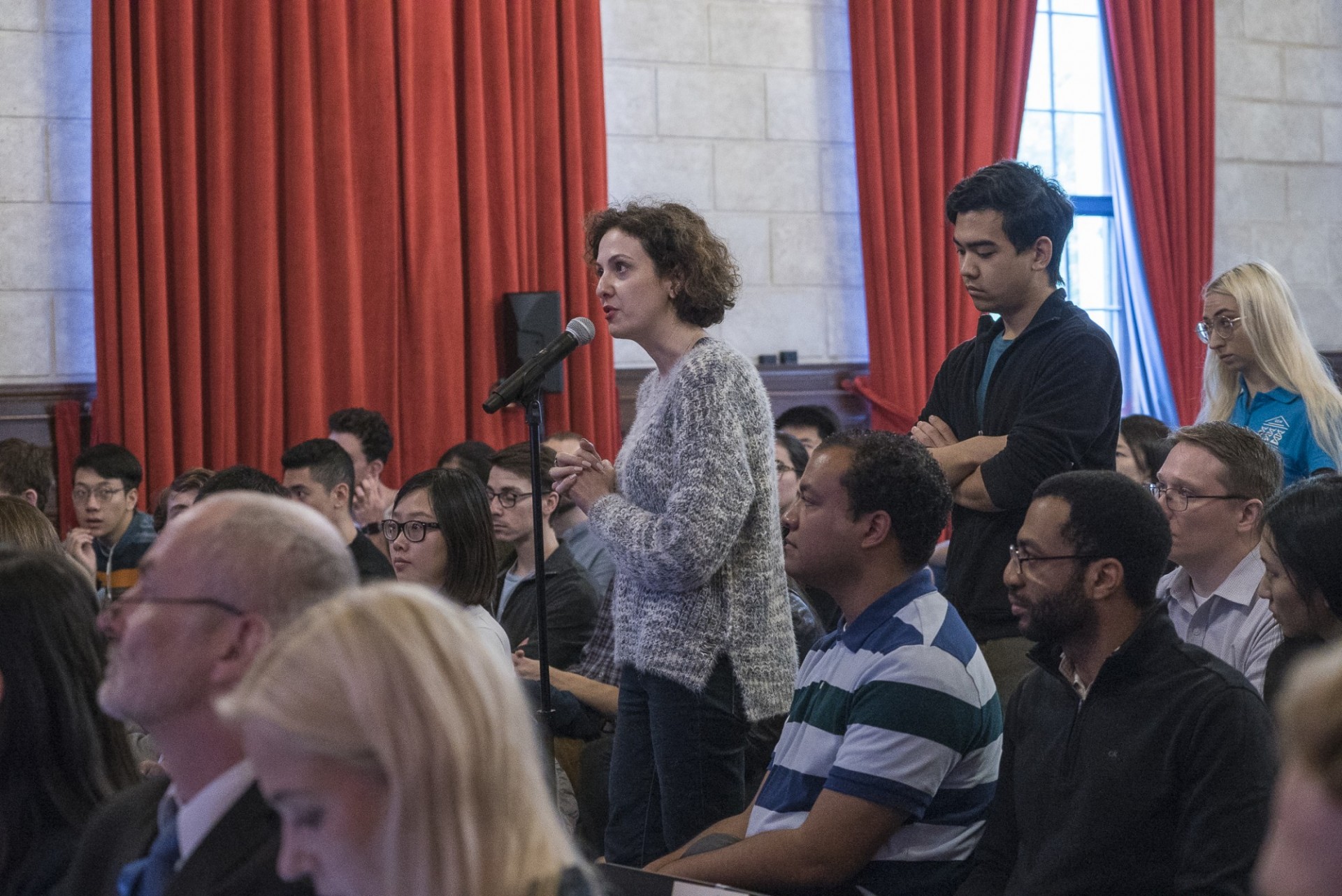 Columbia University students line up to ask President Kersti Kaljulaid of Estonia questions during the question and answer session.