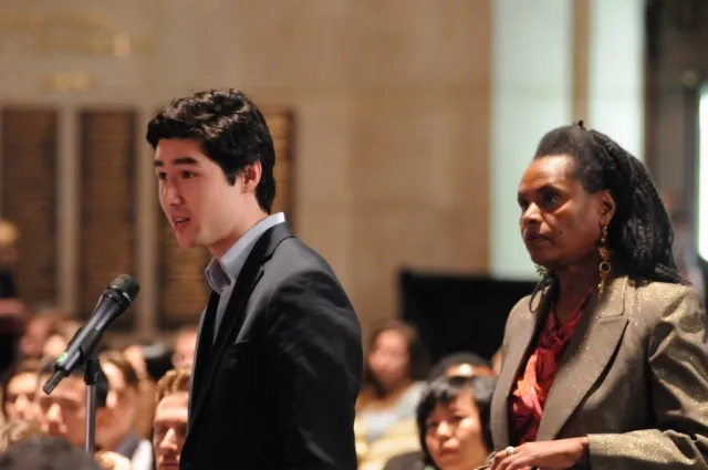 Columbia University students line up to ask Daniel K. Tarullo a question during the question and answer session.