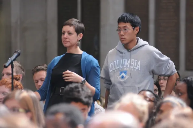 Columbia University students and audience members line up to ask the panelists a question during the question and answer session.