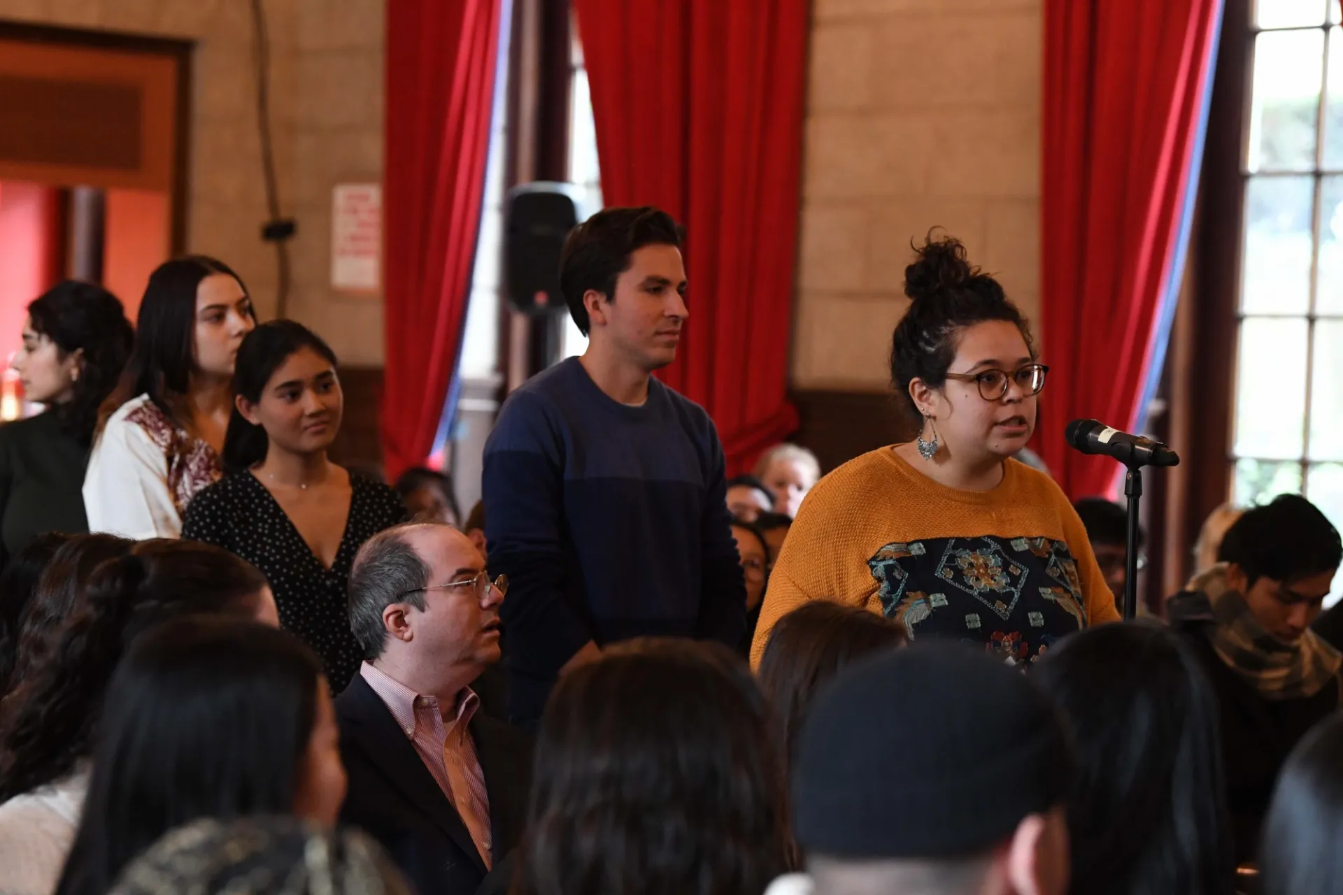 Columbia University students line up to ask Mr. Zeid Ra'ad Al Hussein, United Nations High Commissioner for Human Rights a question during the question and answer session.