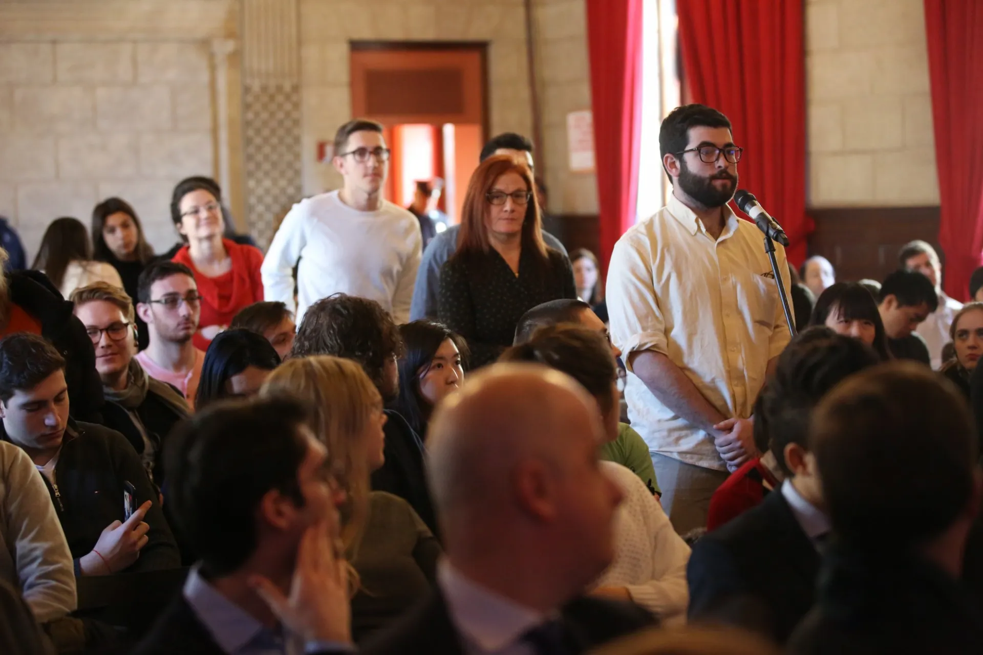 Columbia University students line up to ask President Antonio Tajani of the European Parliament questions during the question and answer session.