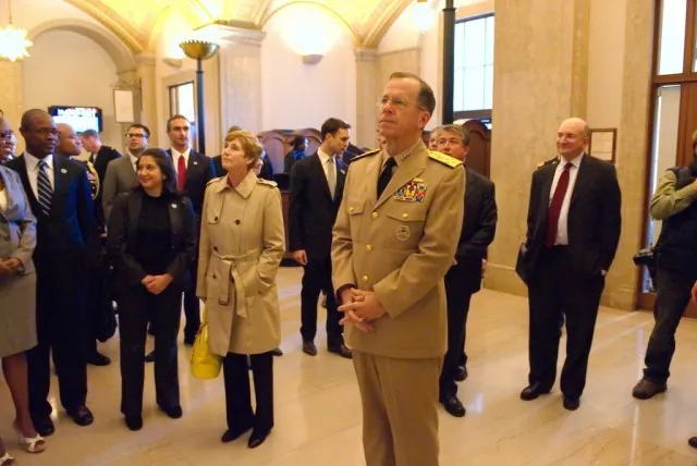 Admiral Mullen visits the Memorial Plaque in Butler Library.