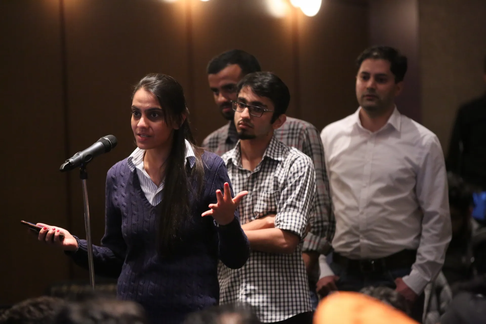 Columbia University students line up to ask questions during the question and answer session.