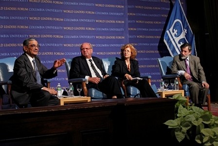 Panelists Jagdish Bhagwati, Ambassador Michael Moore, moderator Merit E. Janow, and panelist Leif Pagrotsky engage in the panel discussion.