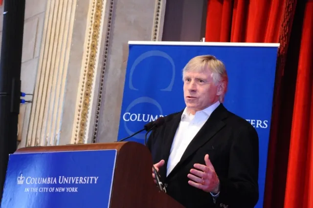 President Bollinger welcomes students to the roundtable discussion.