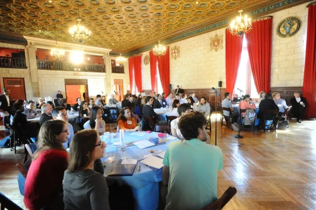 Students actively engaged in the presentation and participation in the roundtable discussions.