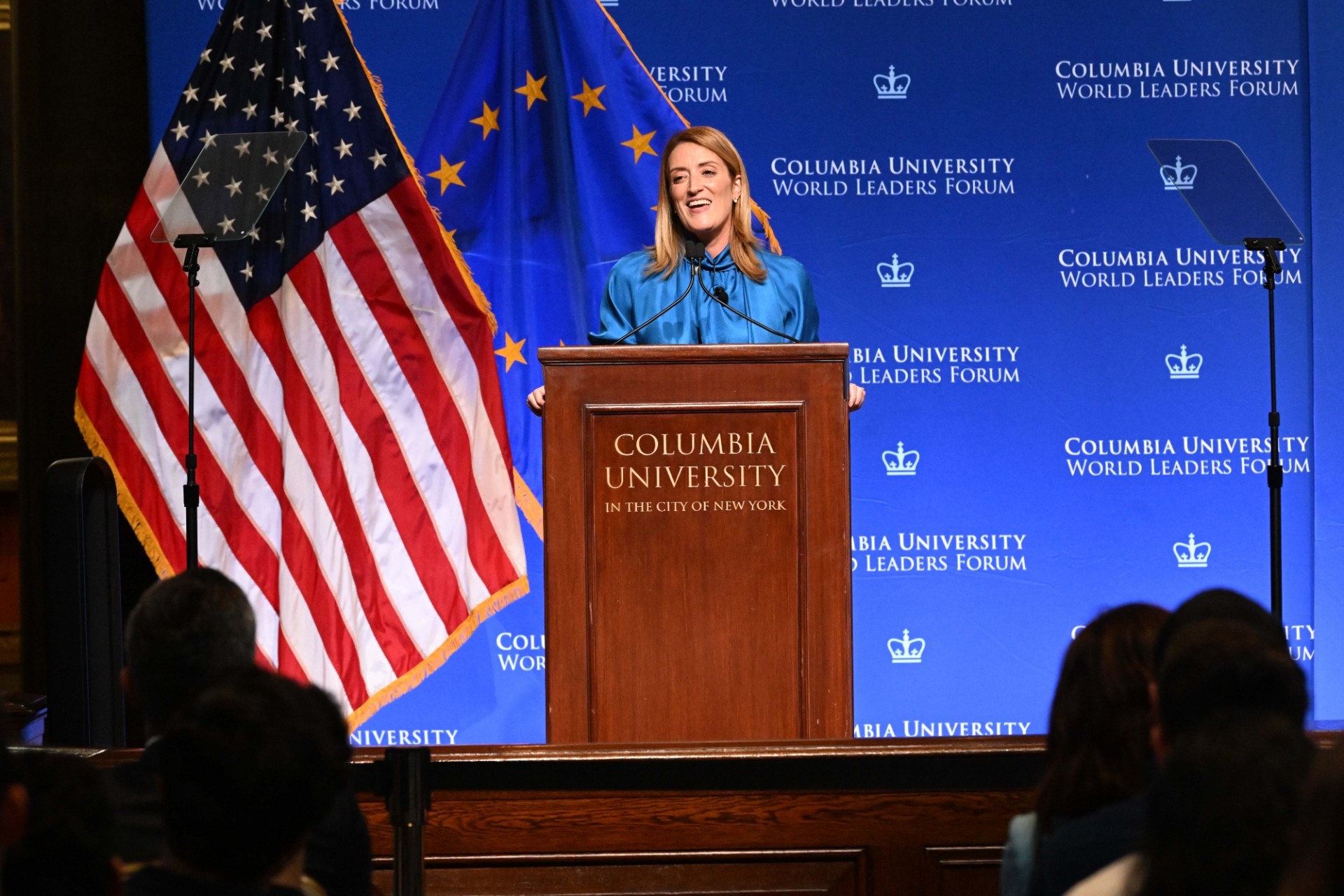 President Roberta Metsola of the European Parliament speaking at the podium during the World Leaders Forum