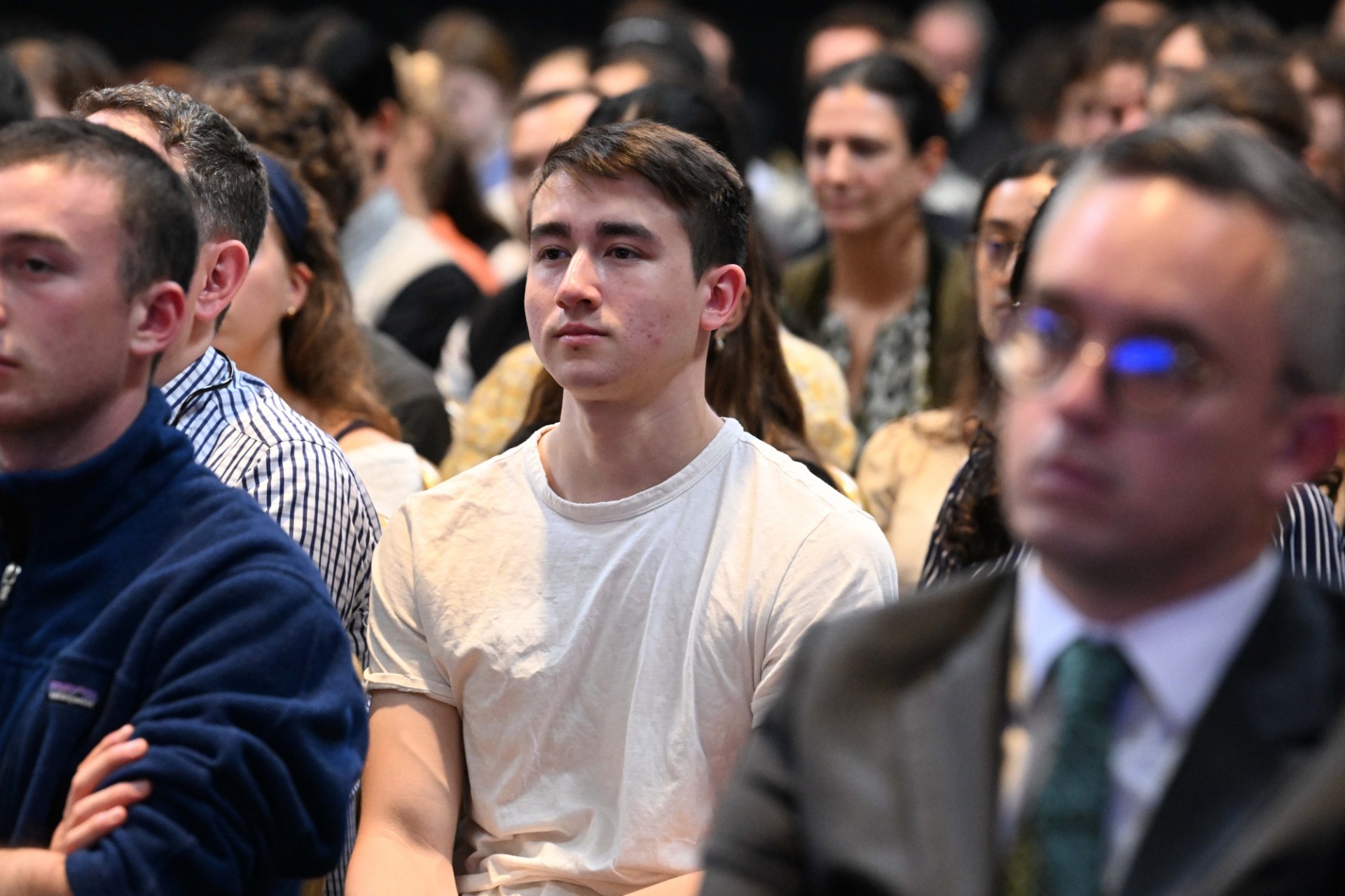 Audience members listen to a conversation with President Roberta Metsola of the European Parliament and Columbia University President Minouche Shafik, during the World Leaders Forum