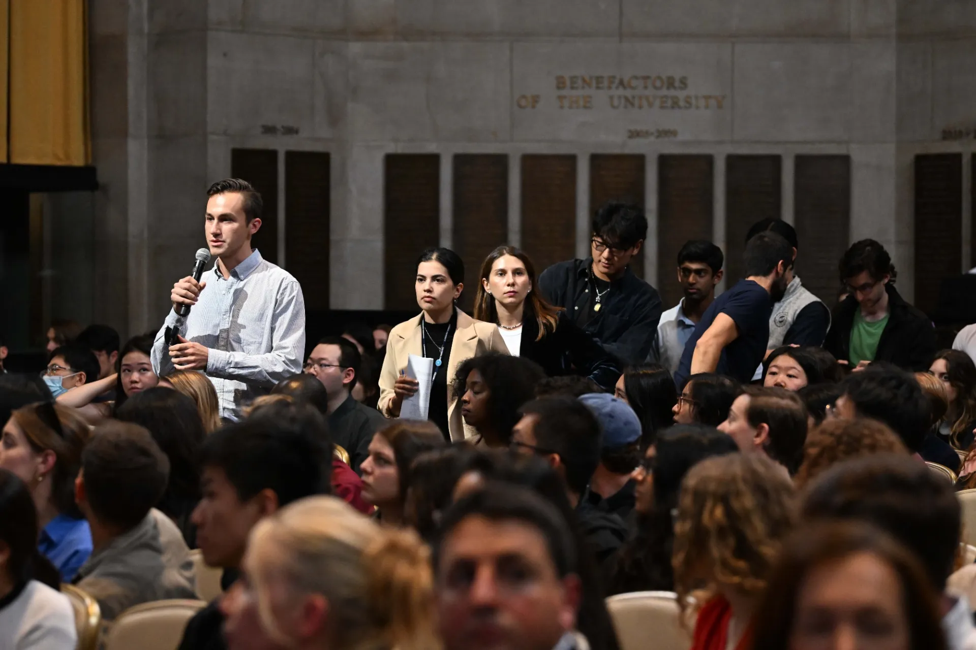 Columbia University students line up and ask questions during the World Leaders Forum event Q&A