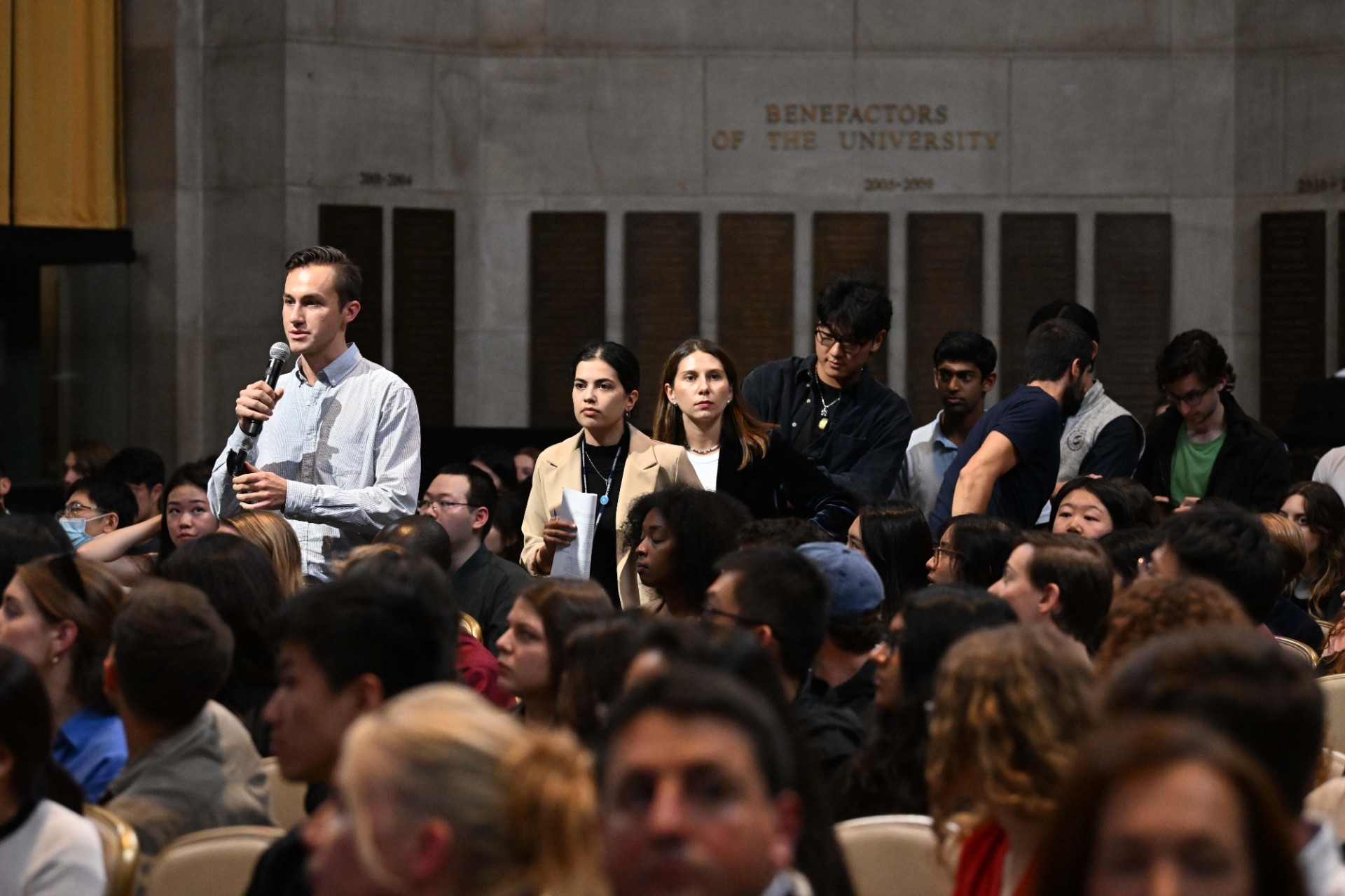 Columbia University students line up and ask questions during the World Leaders Forum event Q&A