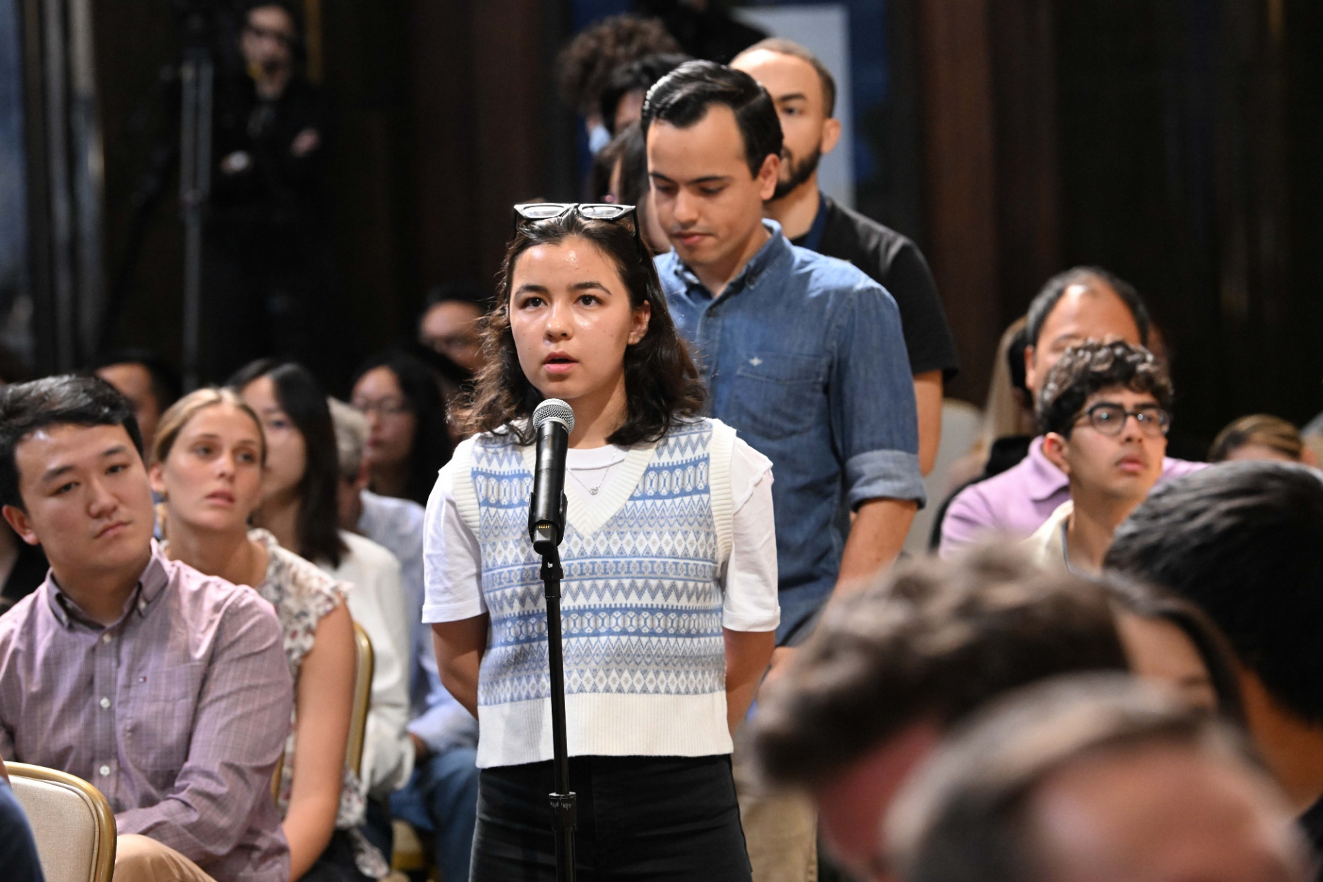 Columbia University students line up and ask questions during the World Leaders Forum event Q&A