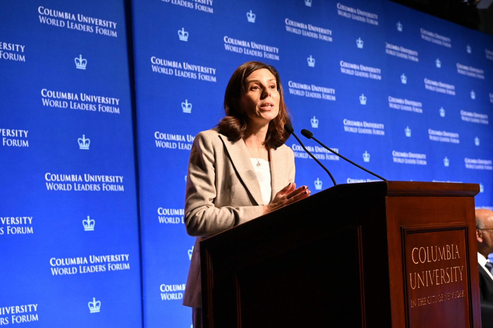 Dean of the School of International and Public Affairs Keren Yarhi-Milo speaking at the podium during the World Leaders Forum