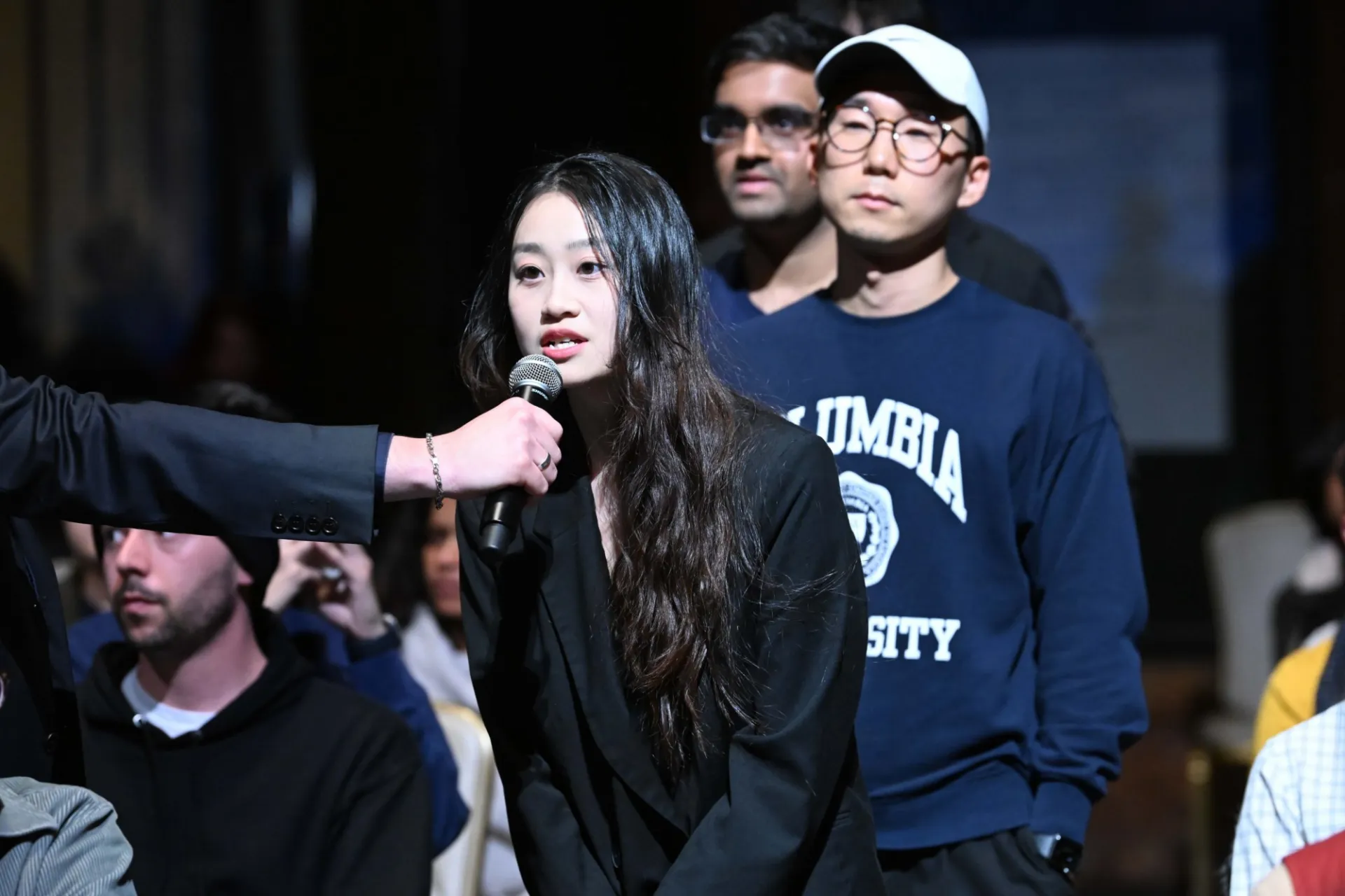 Columbia University students line up and ask questions during the World Leaders Forum event Q&A