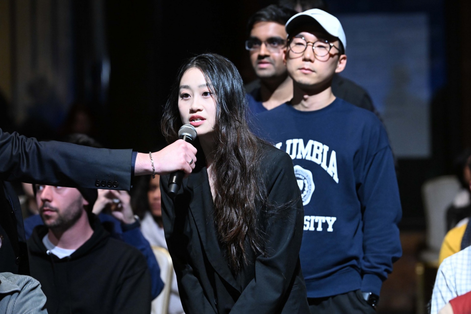 Columbia University students line up and ask questions during the World Leaders Forum event Q&A
