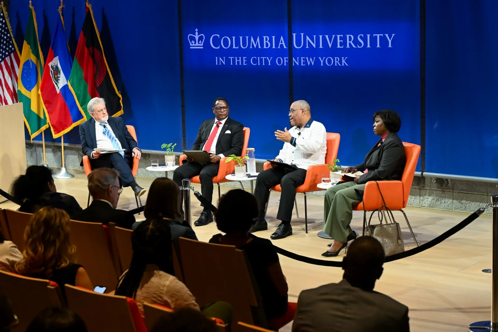 President of Malawi, Prime Minister of Haiti, Founder and CEO of Food Systems for the Future, and Moderator Dr. Glenn Denning engaging in discussion.
