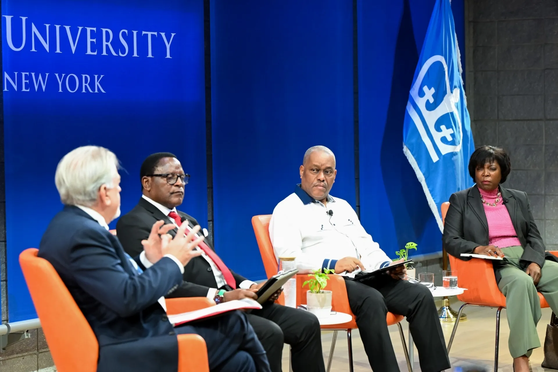 President of Malawi, Prime Minister of Haiti, Founder and CEO of Food Systems for the Future, and Moderator Dr. Glenn Denning engaging in discussion.