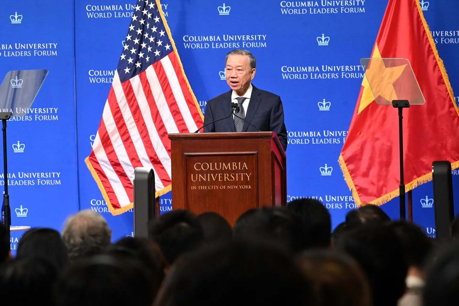 General Secretary, President of Viet Nam speaking at the podium.