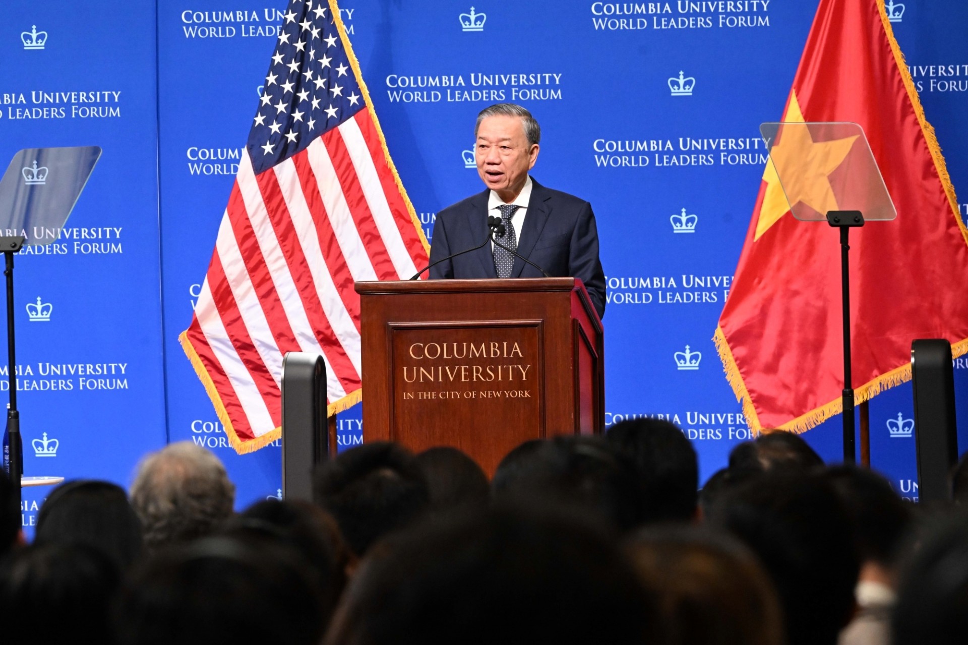 General Secretary, President of Viet Nam speaking at the podium.