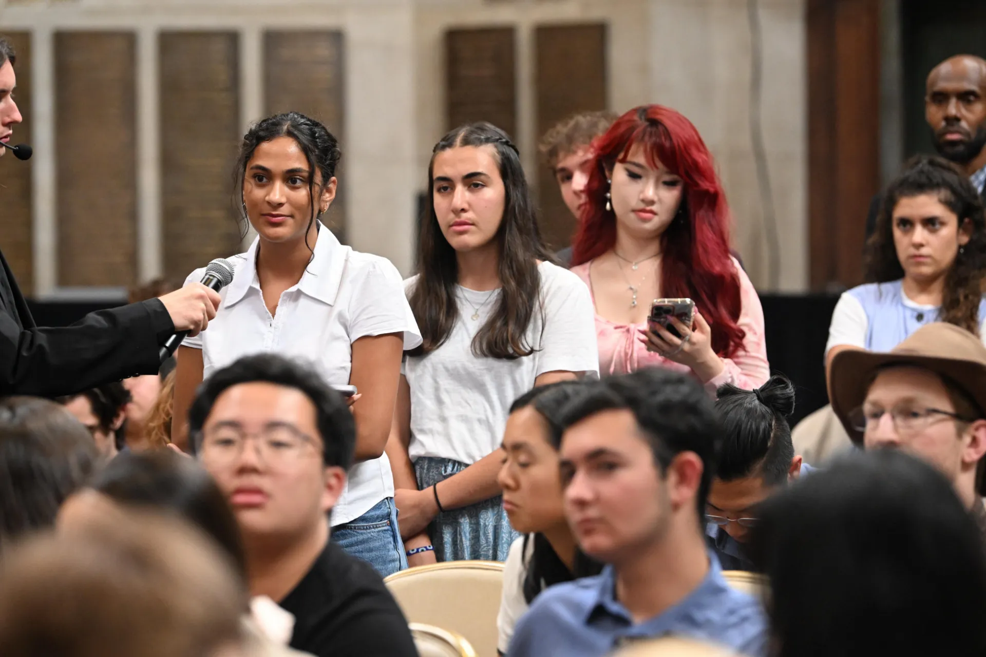 Students asking questions during the live Q&A portion of the program.