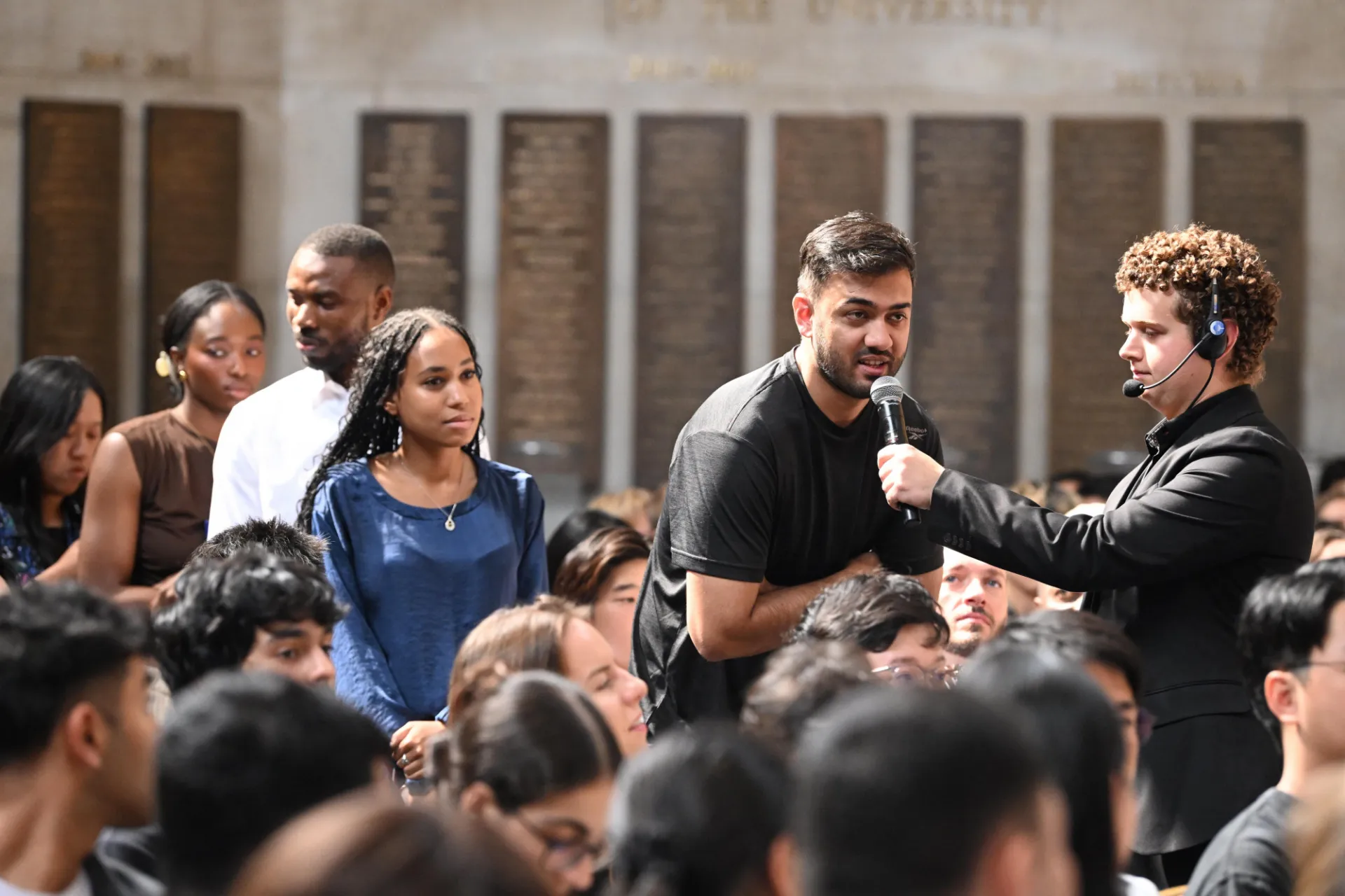 Students asking questions during the live Q&A portion of the program.