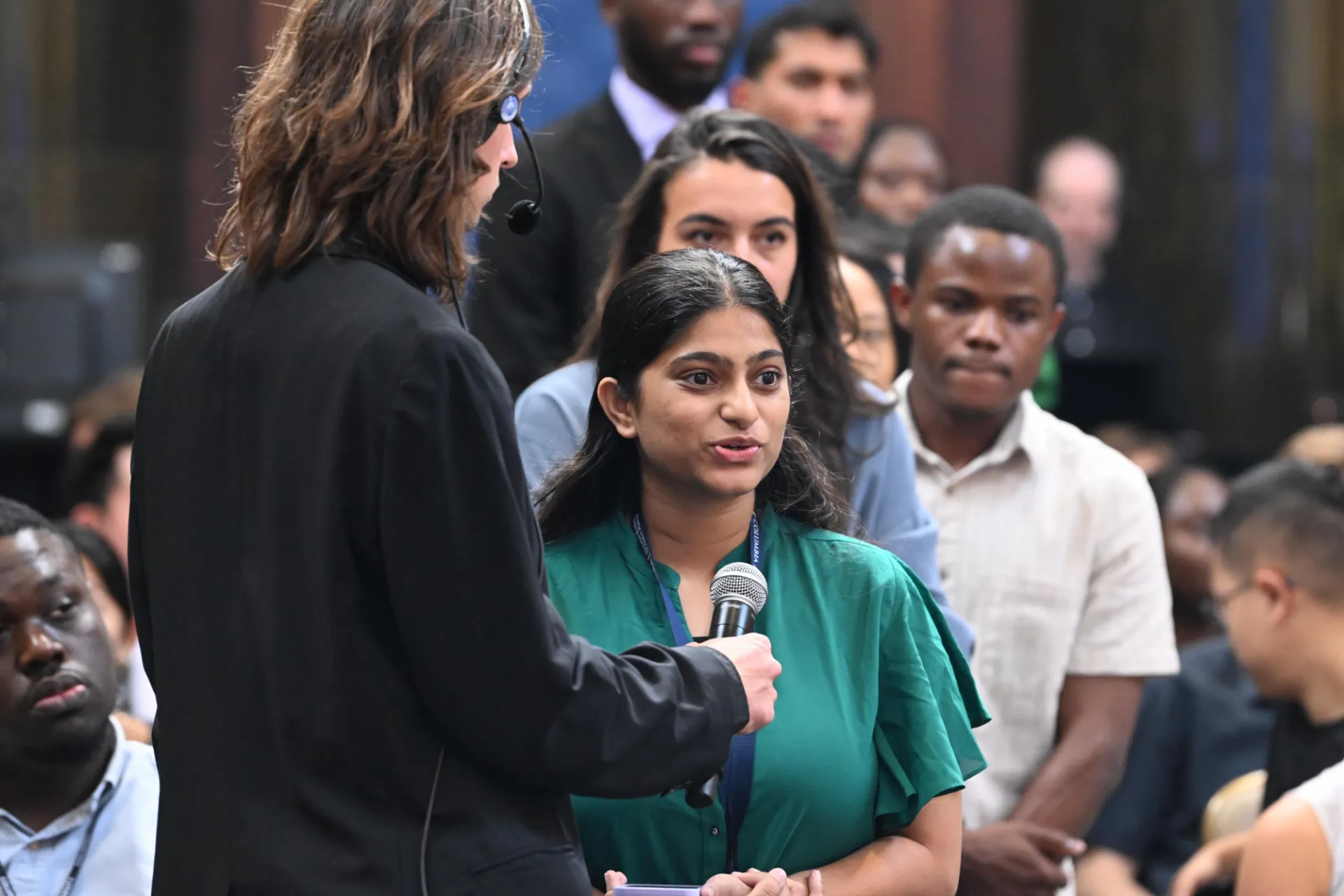 Students asking questions during the live Q&A portion of the program.
