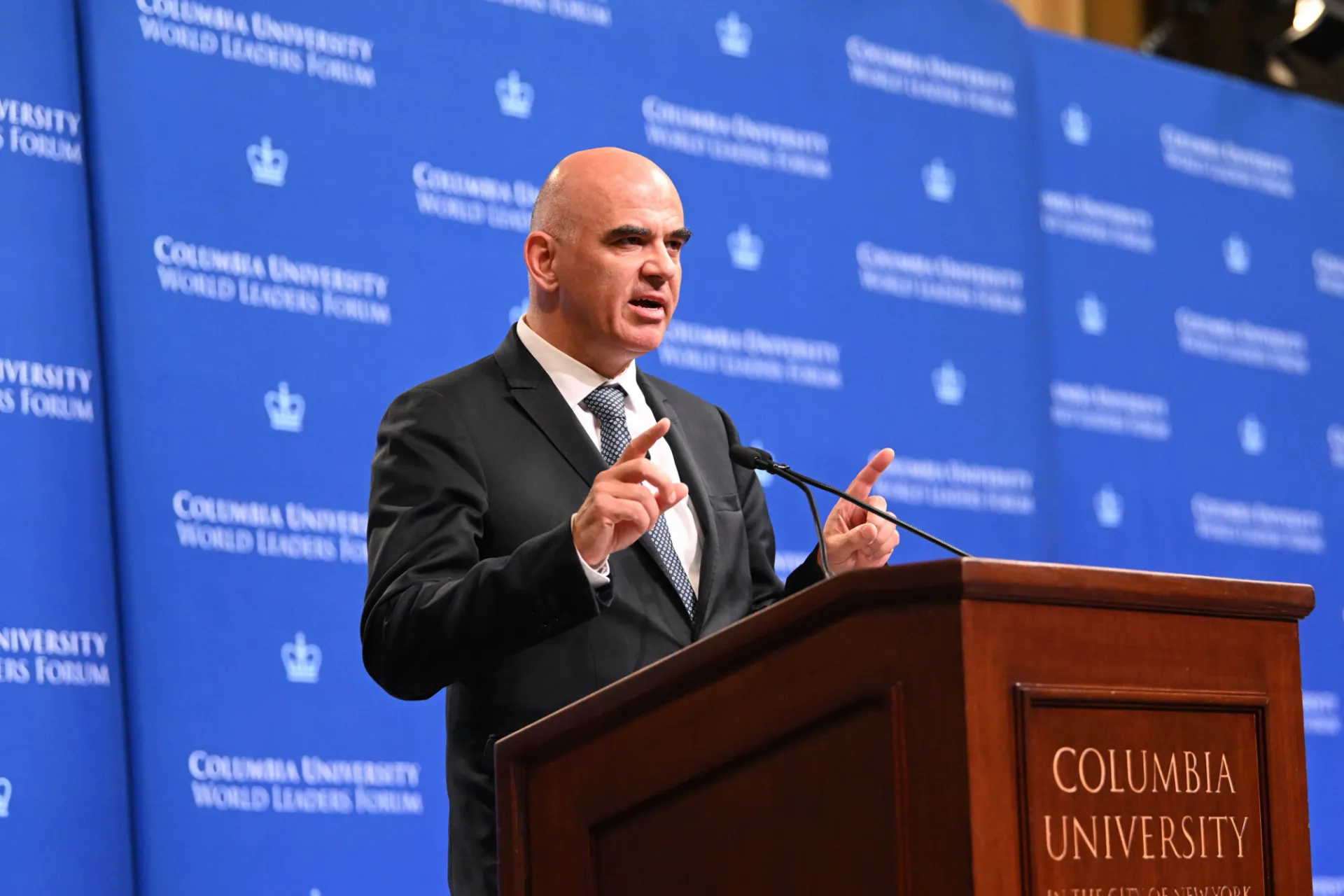 Secretary General Alain Berset delivering remarks at the podium.