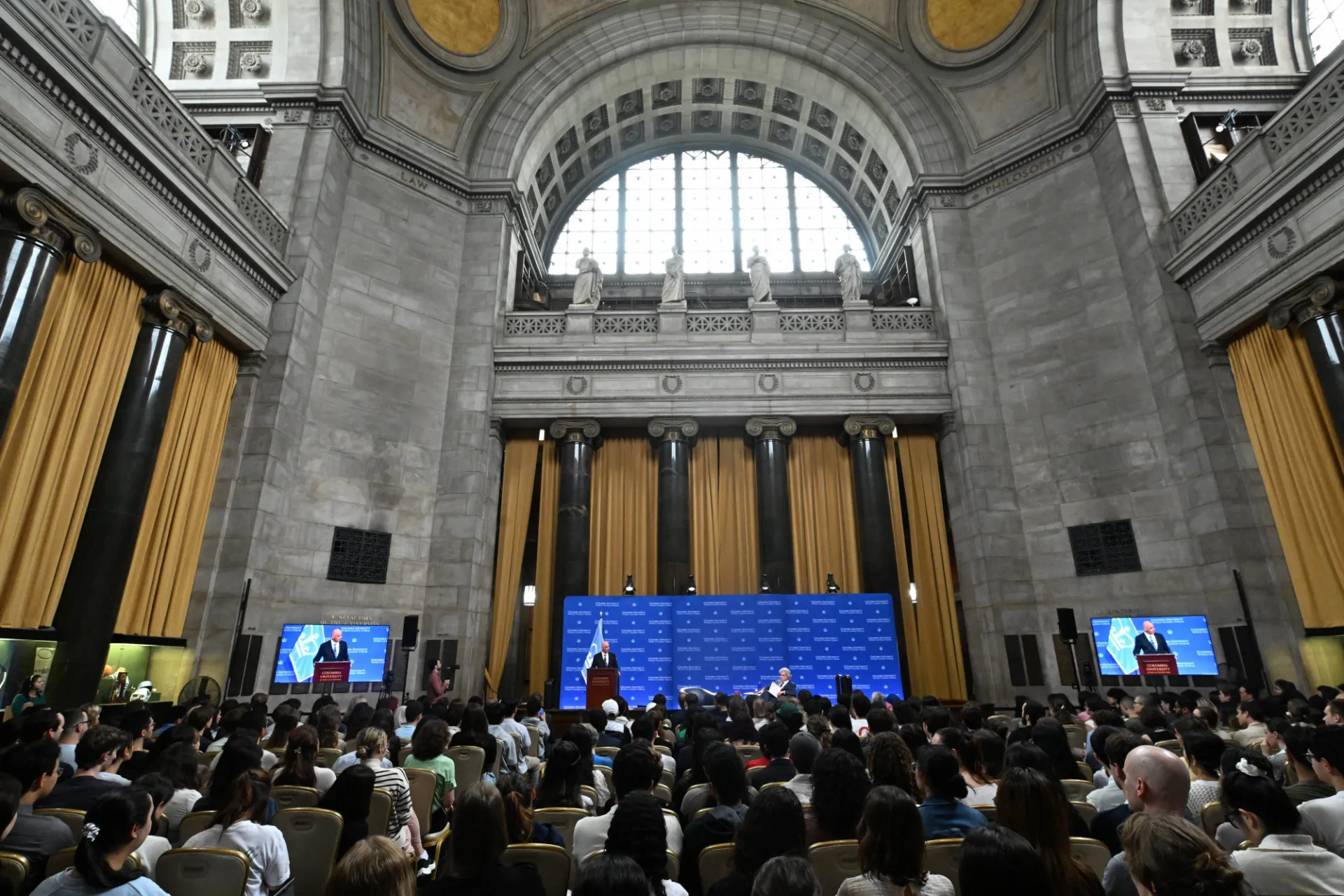 Wide shot of the Secretary General Alain Berset delivering remarks featuring the audience in Low Memorial Library's Rotunda.