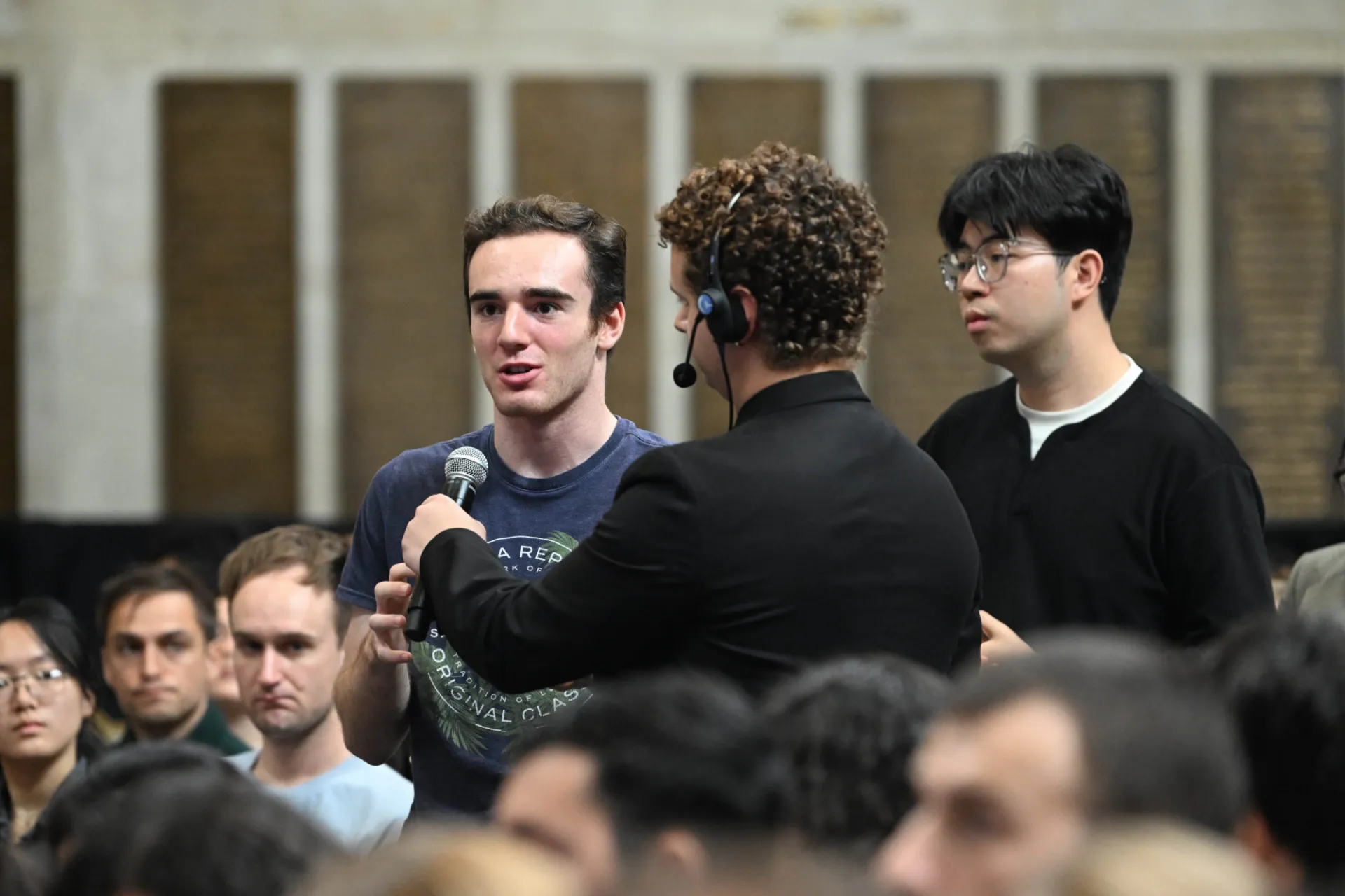 Students asking questions during the live Q&A portion of the program.