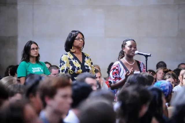 Students pose questions to Mr. Annan.